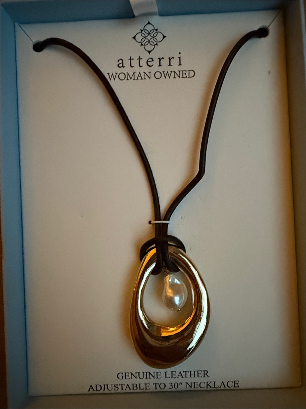 Atterri Gold Oval Pendant Necklace with Black Leather Cord